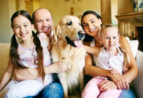 A family with a pet dog.