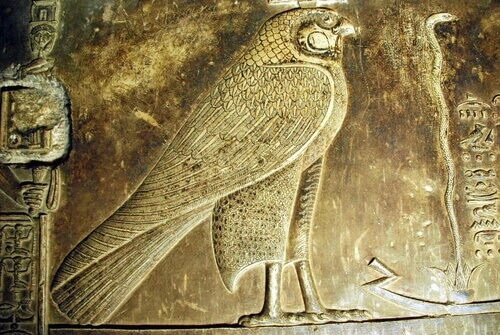 An ancient carving of a falcon.